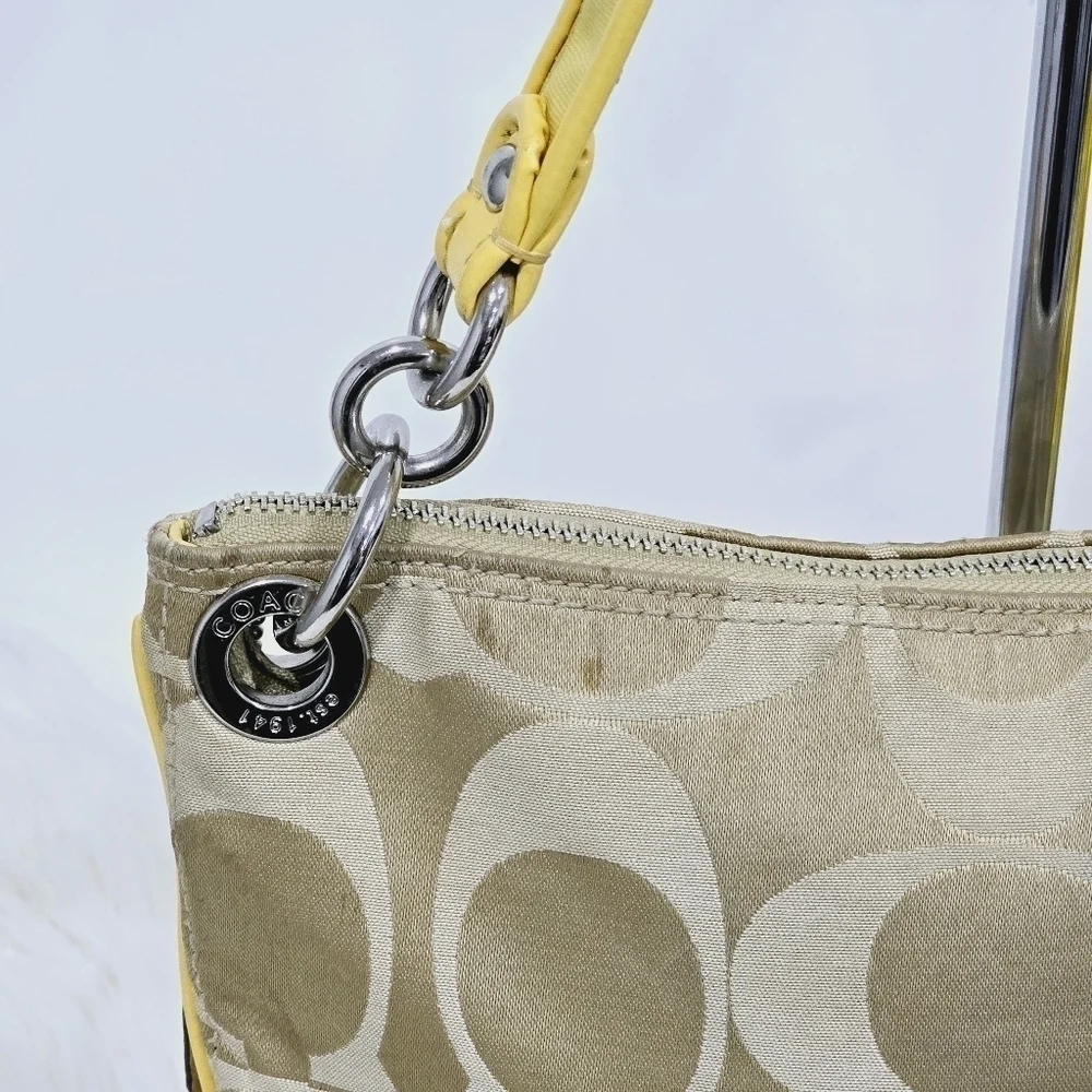 Coach yellow and tan satchel bag